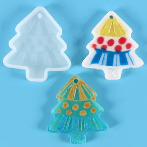 Detail view of Christmas tree silicone mold with finished colorful resin charms