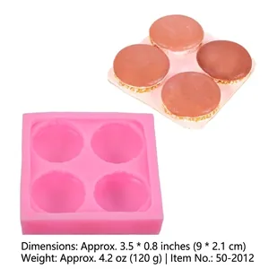 Gedetailleerd overzicht van 4-cavity macaron siliconen mal met afgewerkte monsters.