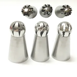 Detailed view of six stainless steel Russian spherical piping tips with distinct patterns
