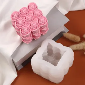 Detailed view of the 3D rose cube silicone mold and pink finished candle product.