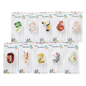 Set of 0-9 cartoon animal number candles for children's birthday party decoration.