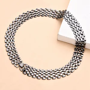 Detailed close-up of a gunmetal-tone wide mesh link necklace in punk hip-hop fashion style.