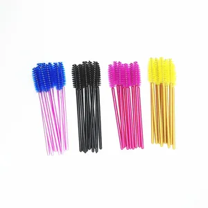 Close-up of disposable colorful mascara brushes in four different color sets