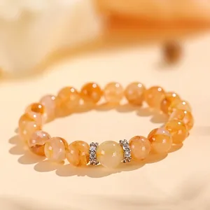 Pulsera de cuentas de cuarzo rutilado dorado con cristales brillantes y espaciadores de plata