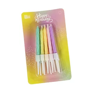 Set of 10 colorful spiral birthday candles in rainbow blister packaging for cake decoration