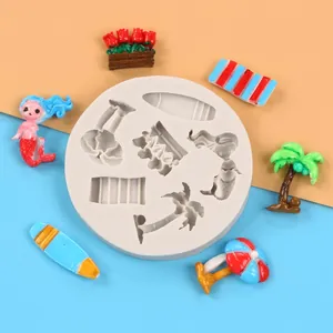 Summer beach themed silicone mold featuring mermaid and palm tree shapes for resin crafts