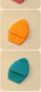 Detailed macro view of jumbo XXL thickened exfoliating sponges in multiple colors