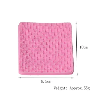 Detail view of pink silicone fondant mold featuring intricate woven texture pattern
