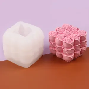 Detail view of rose cube silicone mold and finished pink candle or soap product.