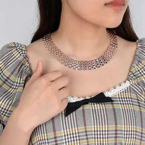 Rose gold chunky wide hollow link choker necklace worn by model punk hip hop style