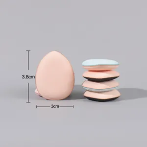 Detailed view of mini finger cushion powder puff with dimensions 3.8cm by 3cm