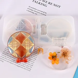 Detail of DIY crystal epoxy resin mold for creating custom diamond lattice compact mirrors