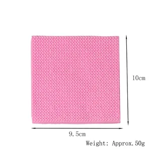 Close-up detail view of pink silicone fondant lace mat with textured wavy pattern for baking
