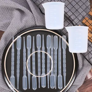 Resumen del juego de herramientas de 14 piezas con tazas de silicona de 100 ml y pipetas