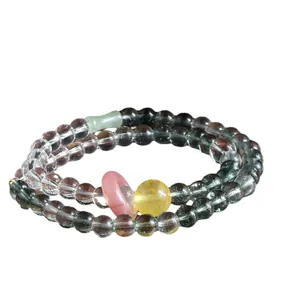 Double-loop crystal beaded bracelet with phantom quartz and colorful gemstone accents