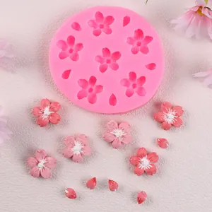 Sakura cherry blossom silicone mold for fondant cake decoration with small pink flowers