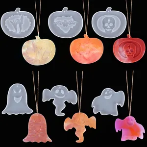 Halloween silicone molds set featuring pumpkin ghost skull shapes for DIY resin pendants