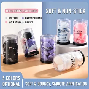 Set of 10 mini finger powder puffs in cylindrical containers for makeup application