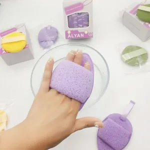 Close-up of a soft purple microfiber cleansing puff in a 3-piece makeup remover set