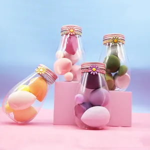 Set d'éponges de maquillage marguerite en bouteilles, formes goutte et biseautées.