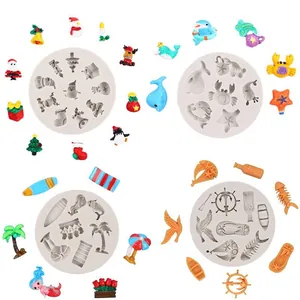 Set of silicone molds for Christmas and ocean animals resin crafts on white background
