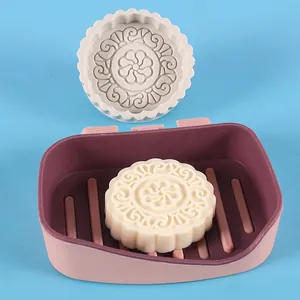 Close-up of silicone mold with traditional mooncake floral pattern for DIY soap