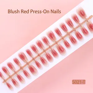 Close-up view of 30 pieces blush pink gradient press-on nails on a bare strip detail