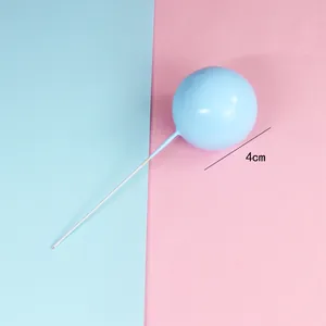 Detail of 4cm diameter light blue metal ball cake topper for party baking decoration