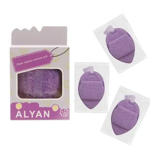 Detailed view of purple teardrop makeup remover sponges in individual and boxed packaging.