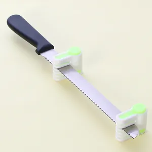 Close-up detail of cake slicer layer guides attached to a serrated bread knife for slicing.