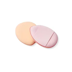 Close-up of mini finger air cushion puff showing sponge texture and strap detail
