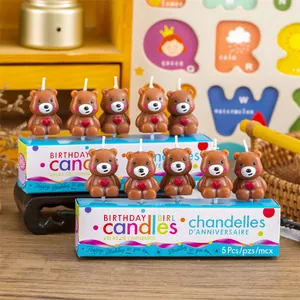 Set of cute brown bear birthday candles with heart detail for cake decoration party supplies