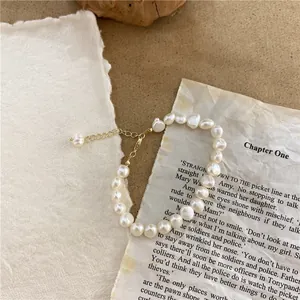 Vintage irregular Baroque natural pearl necklace with adjustable gold chain clasp