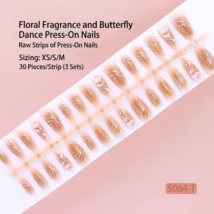 Close-up detail of 30-piece nude press-on nails strip featuring white floral and line designs