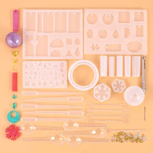 Comprehensive jewelry resin mold kit including silicone molds, pipettes, and tools.