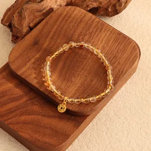 Exquisites Citrin-Kristallarmband mit goldenem chinesischem Münzanhänger für Reichtum und Glück