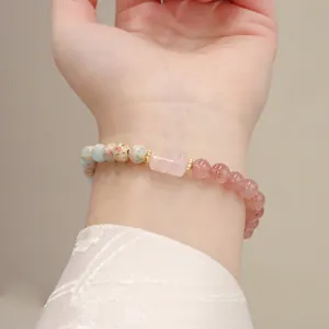 Elegant pink strawberry quartz beaded bracelet featuring natural Shoushan stone detail