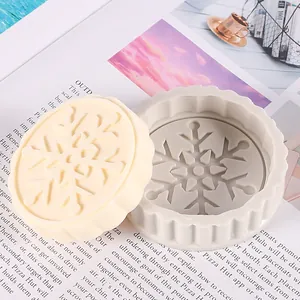 Detailed macro view of a snowflake-shaped silicone mold for DIY candle and soap making