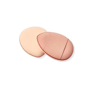 Two mini teardrop-shaped finger cushion puffs for concealer and foundation application