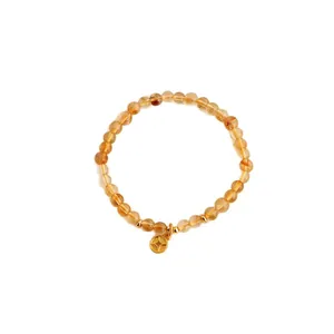 Eleganz Gelbes Rutilquarz-Armband mit traditionellem Goldmünzen-Anhänger für Damen