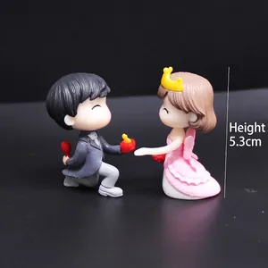 Cute cartoon couple figurines for wedding cake decoration or marriage return gift