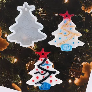 Detailed view of DIY Christmas tree silicone resin mold with finished festive pendants