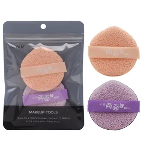 Dual-sided peach and purple makeup sponge puffs in ALYAN professional zip-lock packaging