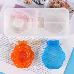 Detail view of DIY rose and shell silicone molds with finished resin mirror backs