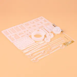 Comprehensive DIY jewelry resin mold kit including silicone molds and metal tool accessories.