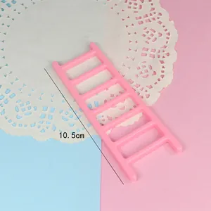 Pink plastic miniature cloud ladder cake topper decoration for DIY baking, 10.5cm long.