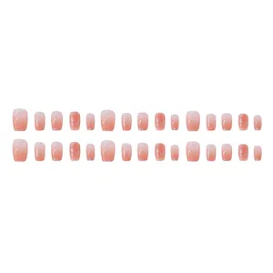 Set of 30 ice translucent nude gradient press-on nails with silver glitter foil accents