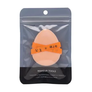 Professional peach teardrop makeup sponge tool in black clear resealable retail packaging