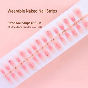 Detailed view of 30pcs peach gradient press-on nails on a pre-made sizing strip.