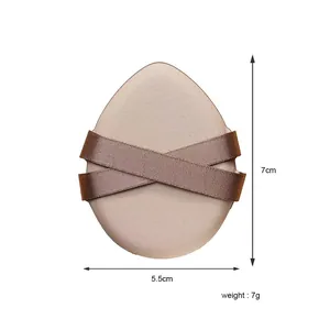 Teardrop makeup puff with double brown ribbons, 7x5.5cm dimensions, 7g weight detail view